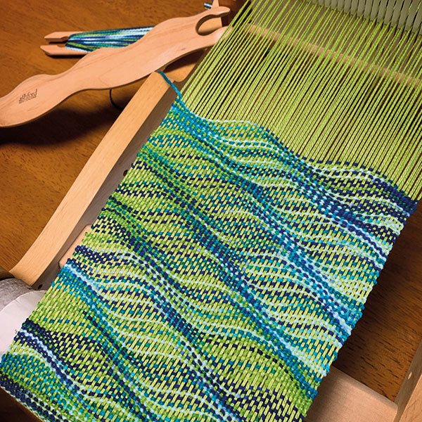 WAVY-SHAPED WEAVE SHOOTER